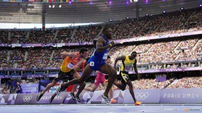 Grant Holloway - Holloway storms into hurdles final, Parchment sneaks in again - channelnewsasia.com - Usa - Jamaica - county Bennett - county Roberts