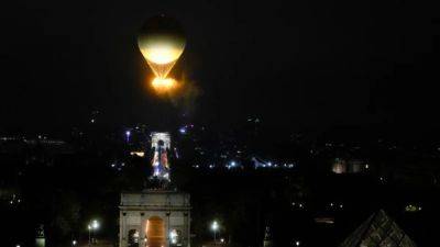 Paris mayor wants Olympic flame balloon to stay near Louvre after games end