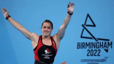 Canada's Charron is an Olympic weightlifting champion. The challenge now is to repeat at a lighter weight