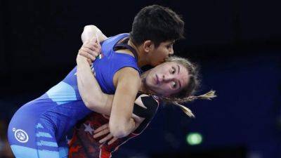 Wrestling-India's Panghal to fly home following discipline breach