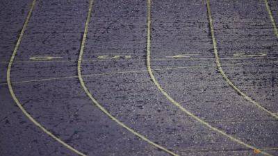 Broadcaster apologises for camera operator walking on to track during 5,000m race - channelnewsasia.com - Jamaica