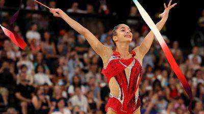 Rhythmic Gymnastics-Italy's Raffaeli leads individual all-around qualifiers