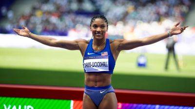 Patrick Smith - Tara Davis-Woodhall captures first Olympic gold of career in women's long jump - foxnews.com - France - Germany - Usa - county Hall