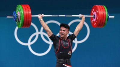 Weightlifting-Indonesia's Juniansyah wins men's 73kg gold medal