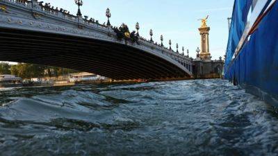 Hungary's Rasovszky claims men's 10km marathon gold