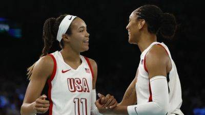 US women go for gold again after rolling past Australia