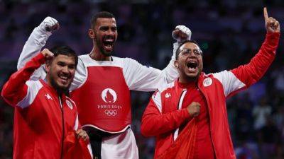 Taekwondo-Tunisia's Katoussi wins men's welterweight gold