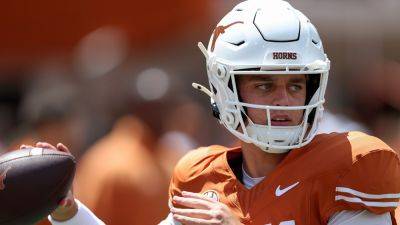 Steve Sarkisian - Tim Warner - Darrell K.Royal - Arch Manning records first college touchdowns as Texas runs over Colorado State in season opener - foxnews.com - state Texas - state Colorado