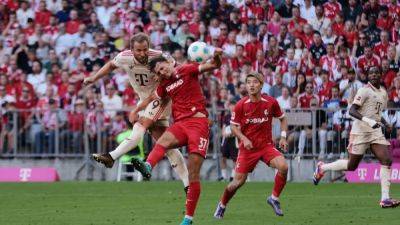 Kane and Muller lift Bayern to 2-0 home win over Freiburg