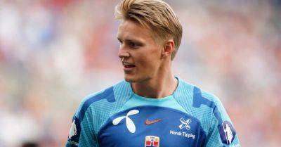 Arsenal’s Martin Odegaard limps out of Norway win with apparent ankle injury