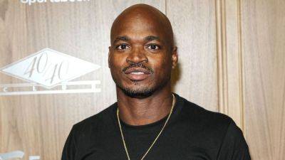 Adrian Peterson ordered to turn over assets to pay $12M debt - ESPN