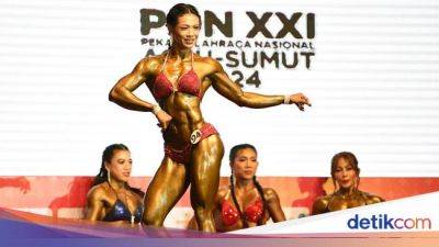 Pose Ciamik Atlet Binaraga Wanita di PON XXI