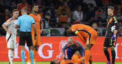 Nathan Ake carried off as Netherlands and Germany draw in Amsterdam