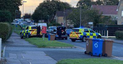 LIVE: Armed police descend on street and point guns at property - latest updates - manchestereveningnews.co.uk