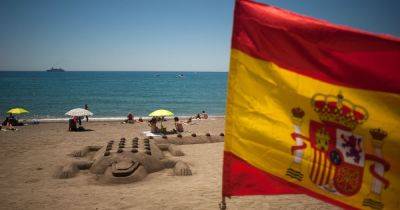 Topless Brits holidaying in popular Spanish destination targeted by posters and €750 fine