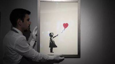 Two men charged with stealing Banksy's 'Girl with Balloon' from London gallery