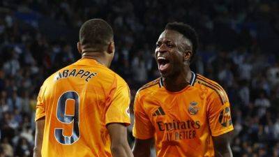 Vinicius, Mbappe penalties give Real Madrid 2-0 win at Sociedad