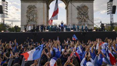 Antoine Dupont - Paris Olympics - Leon Marchand - France bids final farewell to Olympics with Champs-Elysees parade - channelnewsasia.com - France