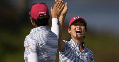 Europe need huge comeback in singles to retain Solheim Cup