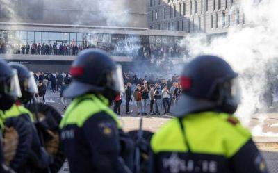 Ajax fans riot in Amsterdam over police strikes