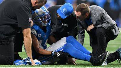 Source - Lions' Amon-Ra St. Brown had contusion, cramping vs. Bucs - ESPN