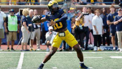 Michigan makes quarterback change, to start Alex Orji vs. USC - ESPN