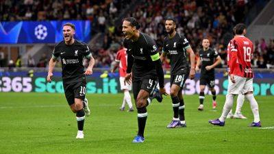 Liverpool overcome early wobble to see off tame AC Milan