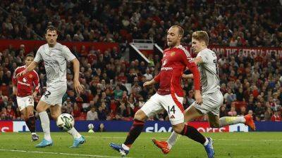 Manchester United put seven goals past Barnsley to progress in League Cup