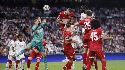 Late goals from Ruediger and Endrick give Real nervy win over Stuttgart