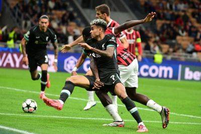 Stylish Liverpool strut past Milan in confident Champions league opener