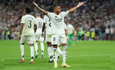 Luka Modric - Carlo Ancelotti - Kylian Mbappe - Hansi Flick - Kylian Mbappe Scores First La Liga Goals As Real Madrid Beat Betis - sports.ndtv.com - France - Spain