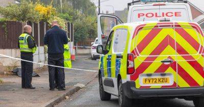 Police tape off Greater Manchester street after animal lung found