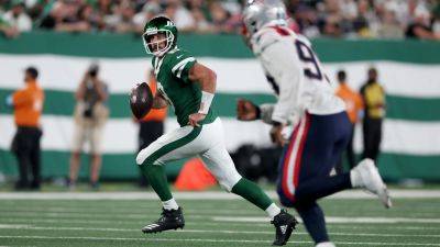 NFL: Aaron Rodgers rolls back the years as New York Jets dismiss New England Patriots