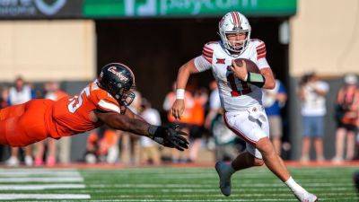 Isaac Wilson makes Utes history in win over No. 14 Oklahoma State - ESPN