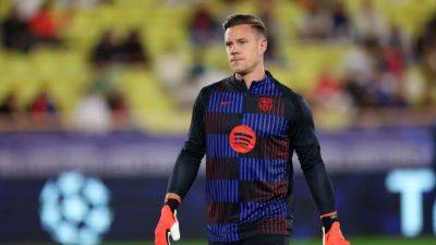 International - Barcelona goalkeeper Ter Stegen to undergo surgery on knee injury - channelnewsasia.com - Germany - Spain