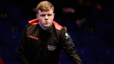 Aaron Hill shocks Ding Junhui as Mark Allen edges Gary Wilson