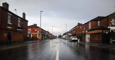 Police race to street in Rusholme after reports of assault