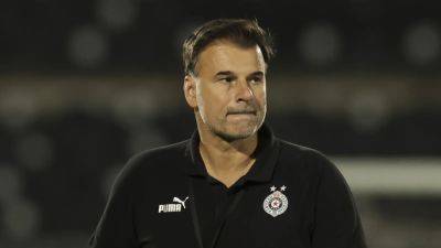 Partizan Belgrade fans attack manager Aleksandar Stanojevic after derby defeat to Red Star