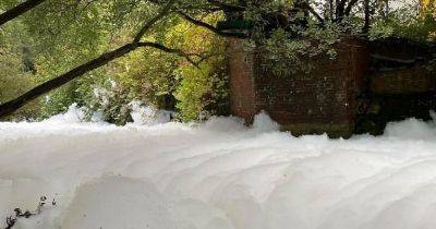 Mystery surrounds foam and bubbles in Greater Manchester river