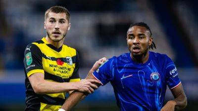 With N.L. on their chests, Barrow AFC take to Stamford Bridge for match with Chelsea