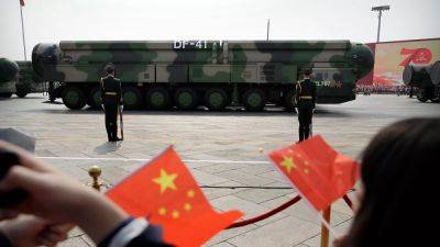 China test-fires intercontinental ballistic missile into Pacific Ocean as tensions with US mount