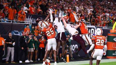 Miami survives as refs overturn Virginia Tech's Hail Mary TD - ESPN