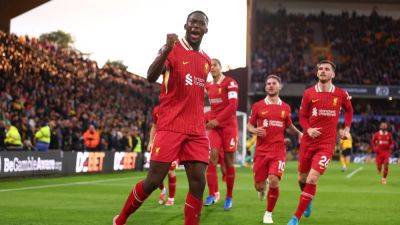 Liverpool unconvincing as they go top with Wolves win