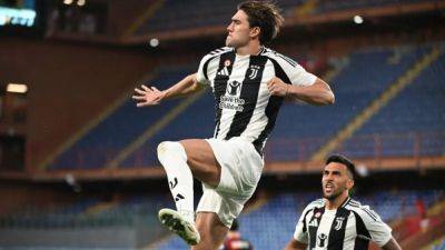 Vlahovic double as Juventus break goal drought to down Genoa