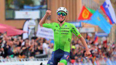 Pogacar solos to first world road title