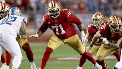 Trent Williams, 49ers finalizing new deal to end holdout - ESPN