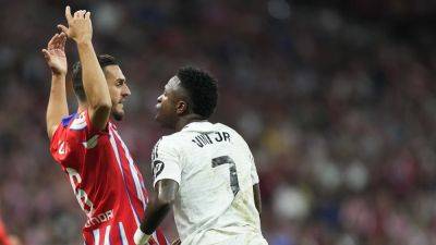 Euro round-up: Spoils shared in tasty Madrid derby