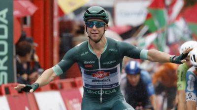 Groves secures third Vuelta stage win in wet sprint