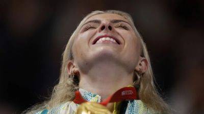 Australian swimmer celebrates gold after fortune teller prediction