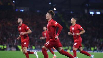 Robert Lewandowski - Scott Mactominay - Anthony Ralston - Billy Gilmour - Grant Hanley - Nicola Zalewski - Poland beat Scotland 3-2 with last-gasp penalty - channelnewsasia.com - Croatia - Portugal - Scotland - Poland